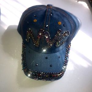 Faded Jean hat with “NYC” across the front and rin-stones around the brim